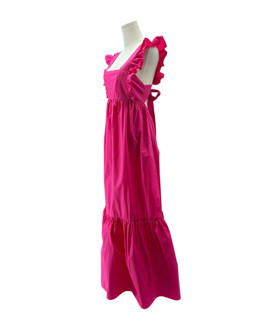 Pink dress on a mannequin against a white background