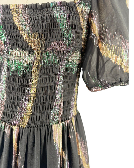 Short puff sleeve black maxi with a metallic print on a mannequin on a white background