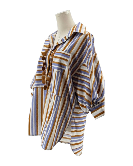 Striped shirt on a mannequin against a white background