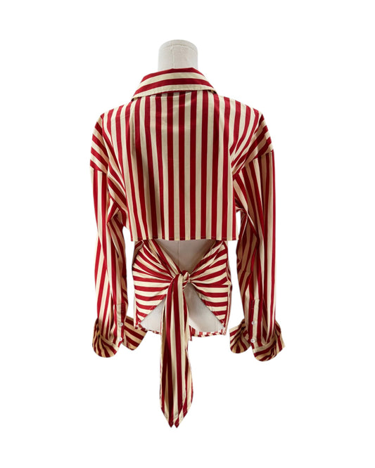 Red and white striped blouse on a mannequin against a white background