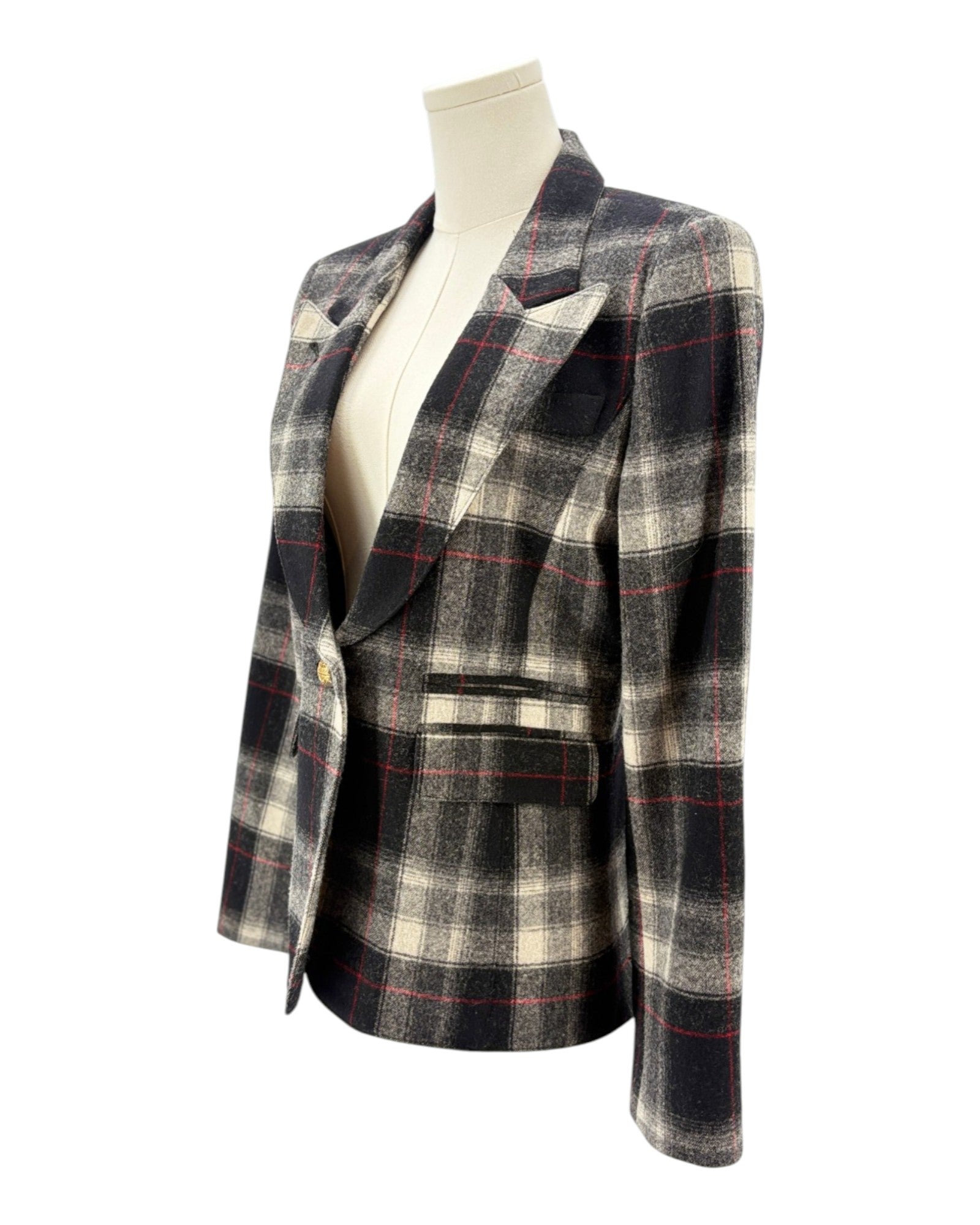 Smythe laid blazer jacket with leather elbow patches on a mannequin against a white background