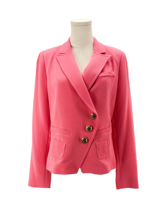 Pink blazer on a mannequin against a white background