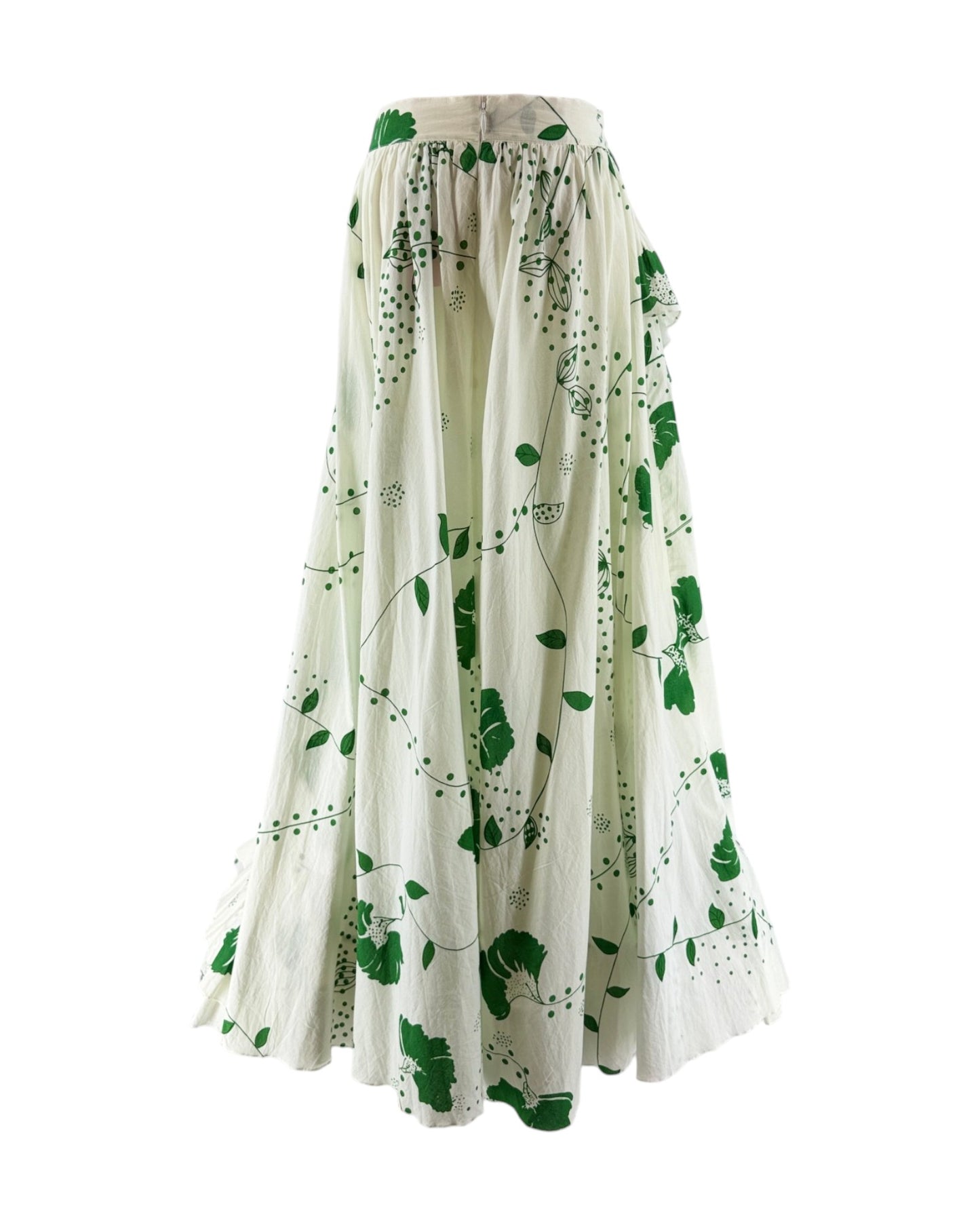 Long white skirt with green leaf pattern on a white background