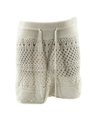 white knitted shorts with lace detailing on a white background