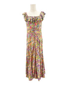 Multicolored floral dress on a mannequin against a white background