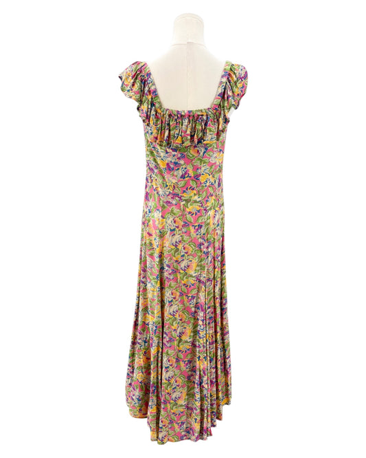 Floral dress on a mannequin against a white background