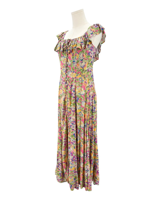 Floral dress on a mannequin against a white background