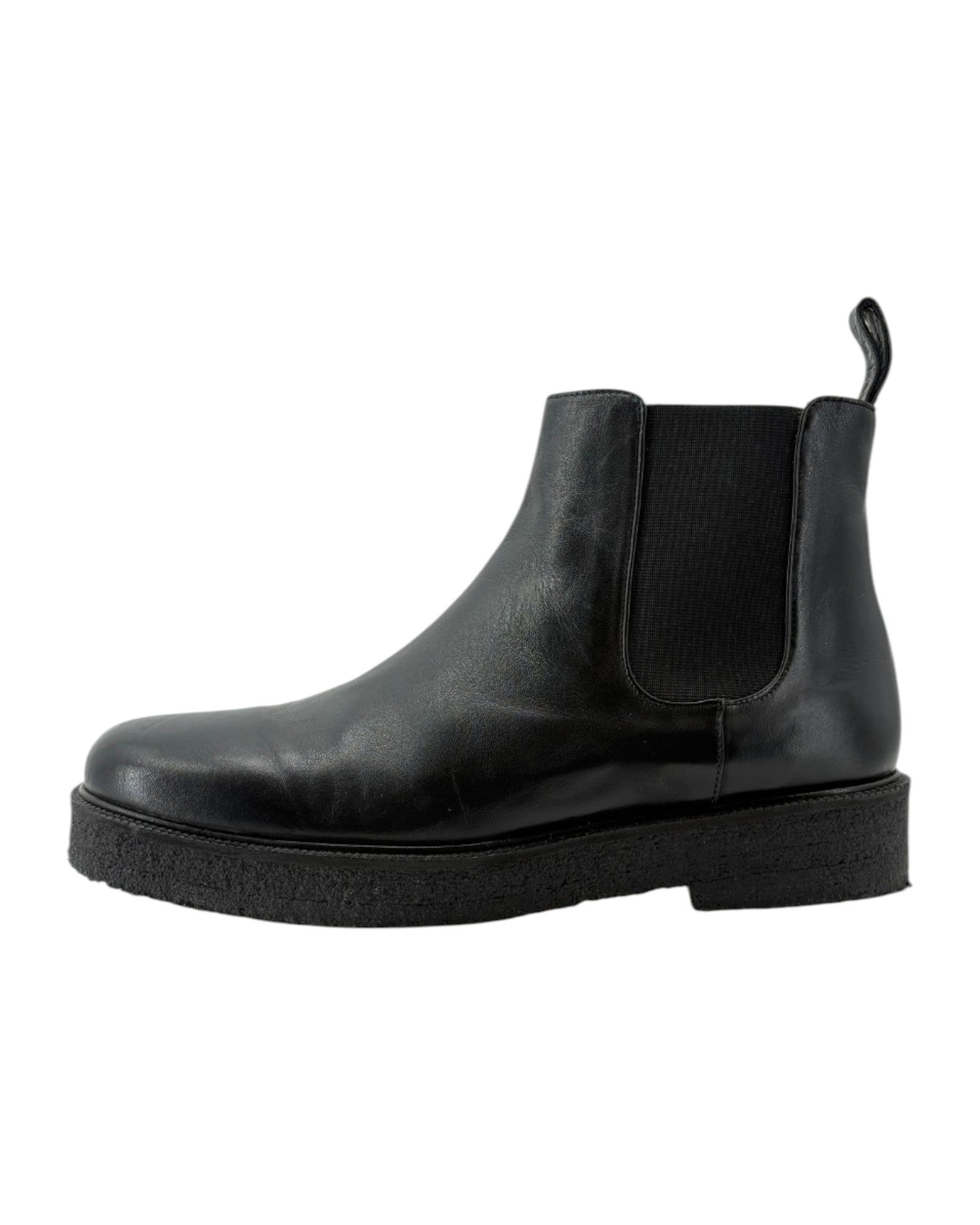 Black leather Chelsea boot on a white background