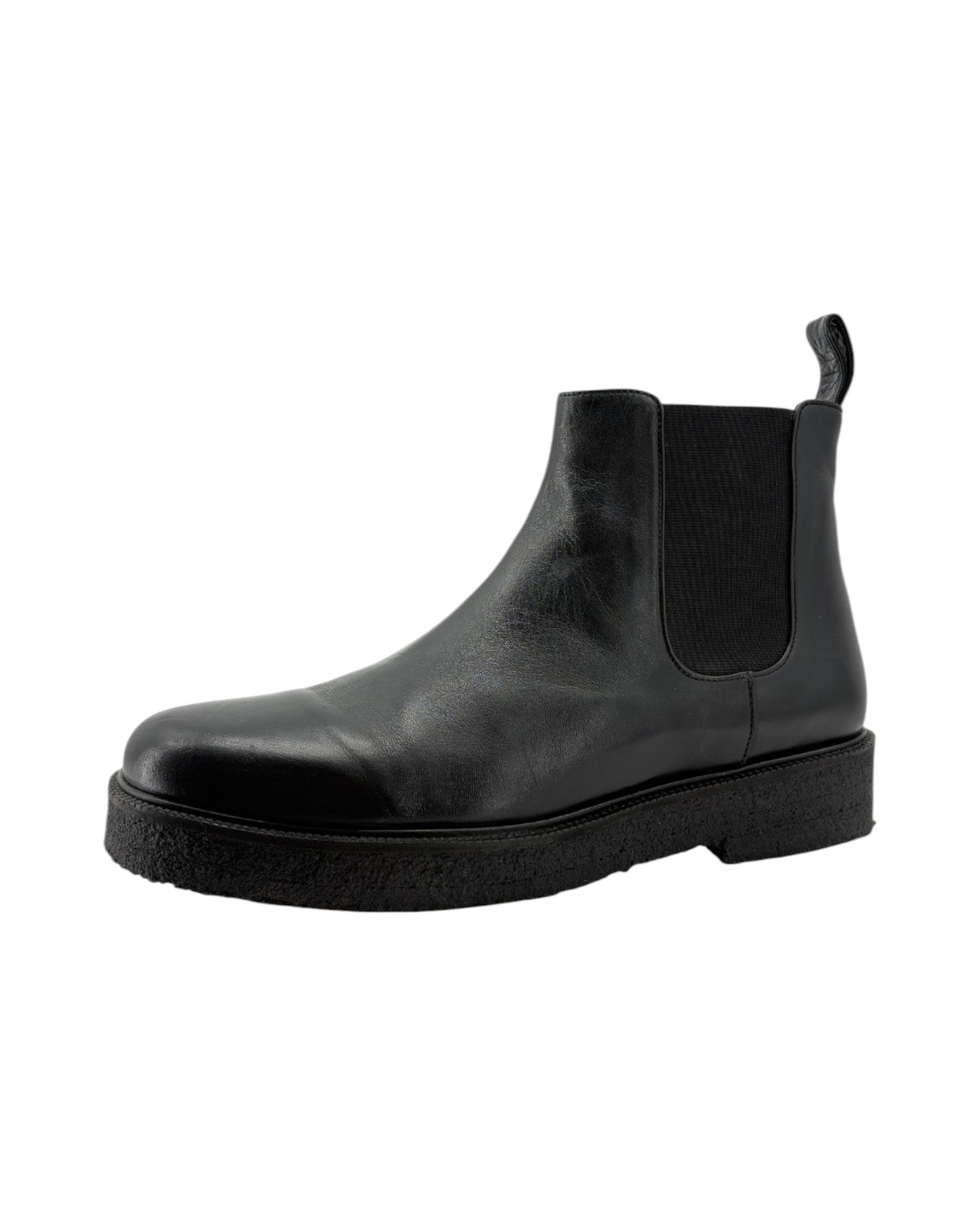 Black Chelsea boot on a white background
