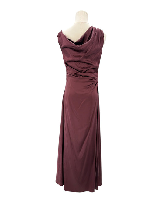 Staud maroon evening gown on a mannequin against a white background
