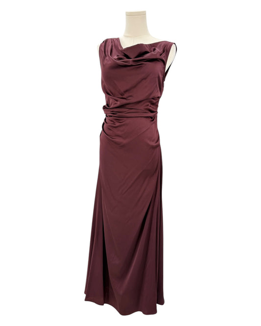 Staud maroon evening gown on a mannequin against a white background