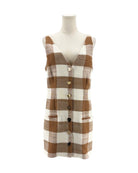 Plaid sleeveless dress on a mannequin against a white background
