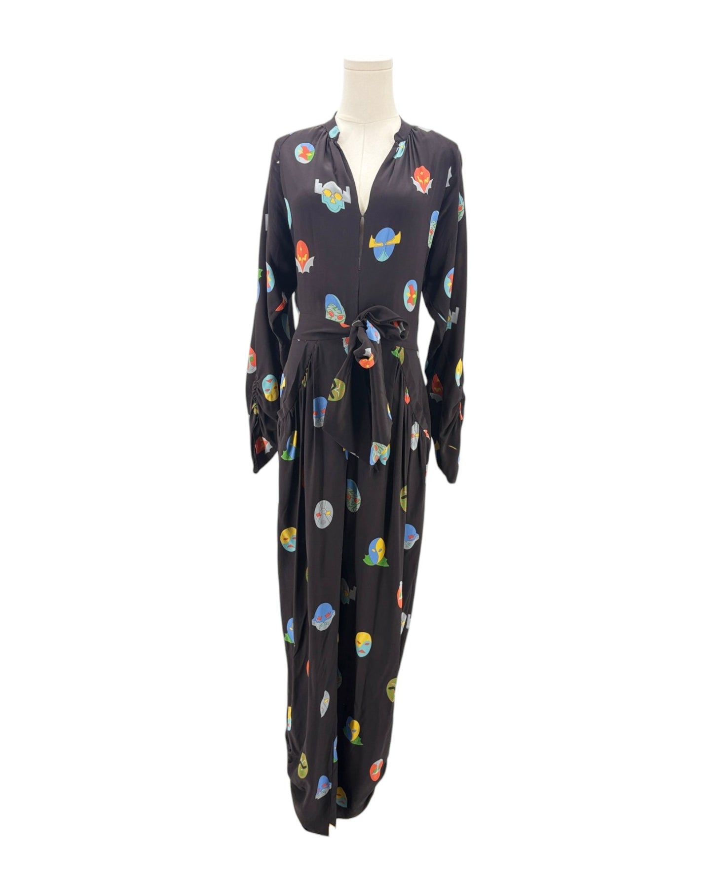 Black jumpsuit with colorful abstract patterns on a mannequin against a white background