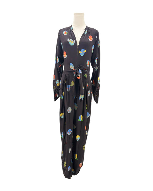 Black jumpsuit with colorful abstract patterns on a mannequin against a white background