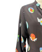 Black jumpsuit with colorful graphic designs on a white background