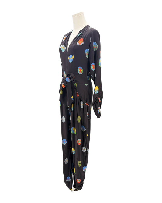 Black jumpsuit with colorful abstract patterns on a mannequin against a white background