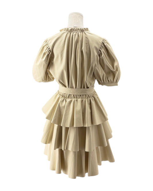 Beige dress with puff sleeves on a white background