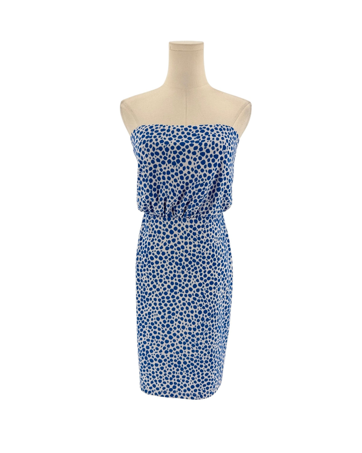 A strapless tube dress with a blue and white floral pattern, displayed on a beige mannequin torso against a plain white background.