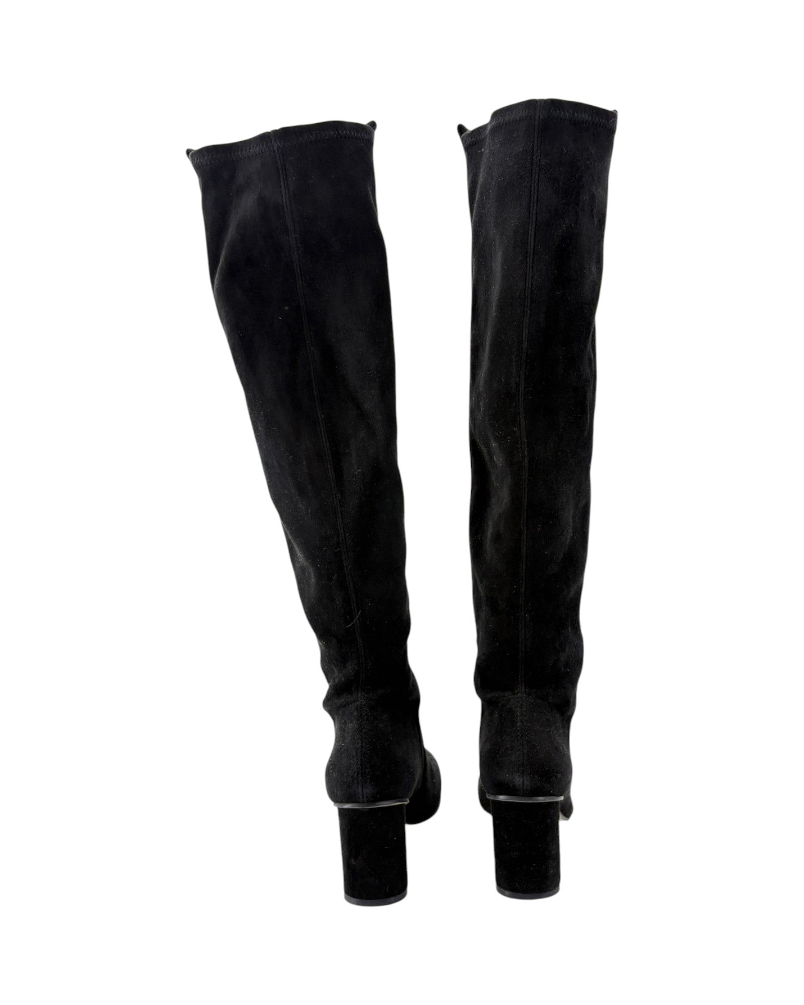 A pair of black suede over-the-knee boots with block heels, shown from the back against a plain white background.
