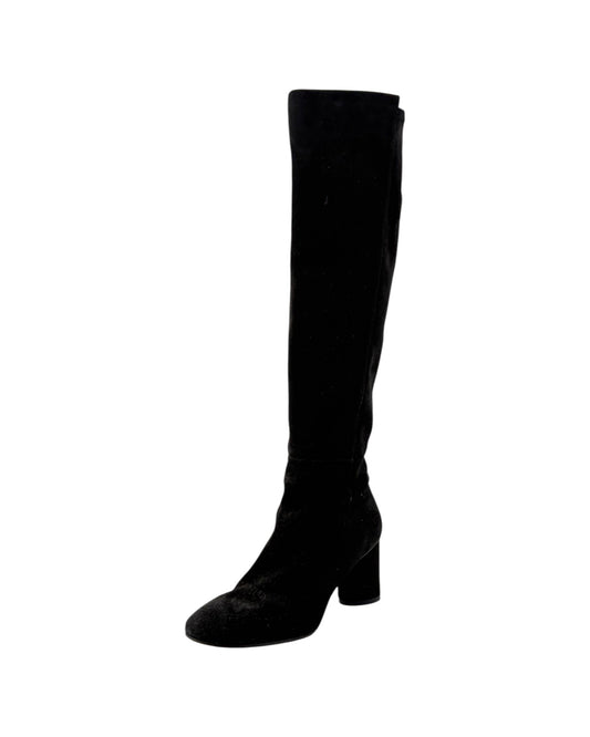 A single black suede over-the-knee boot with a block heel and rounded toe, shown against a plain white background.