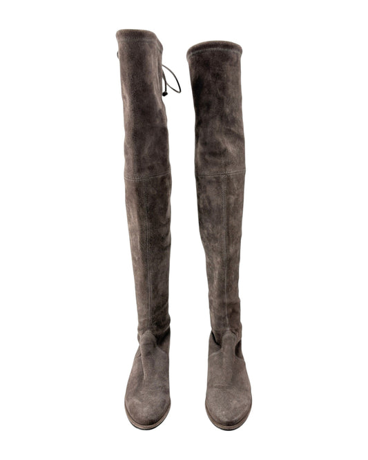A pair of dark brown suede over-the-knee boots shown from the front on a plain white background.