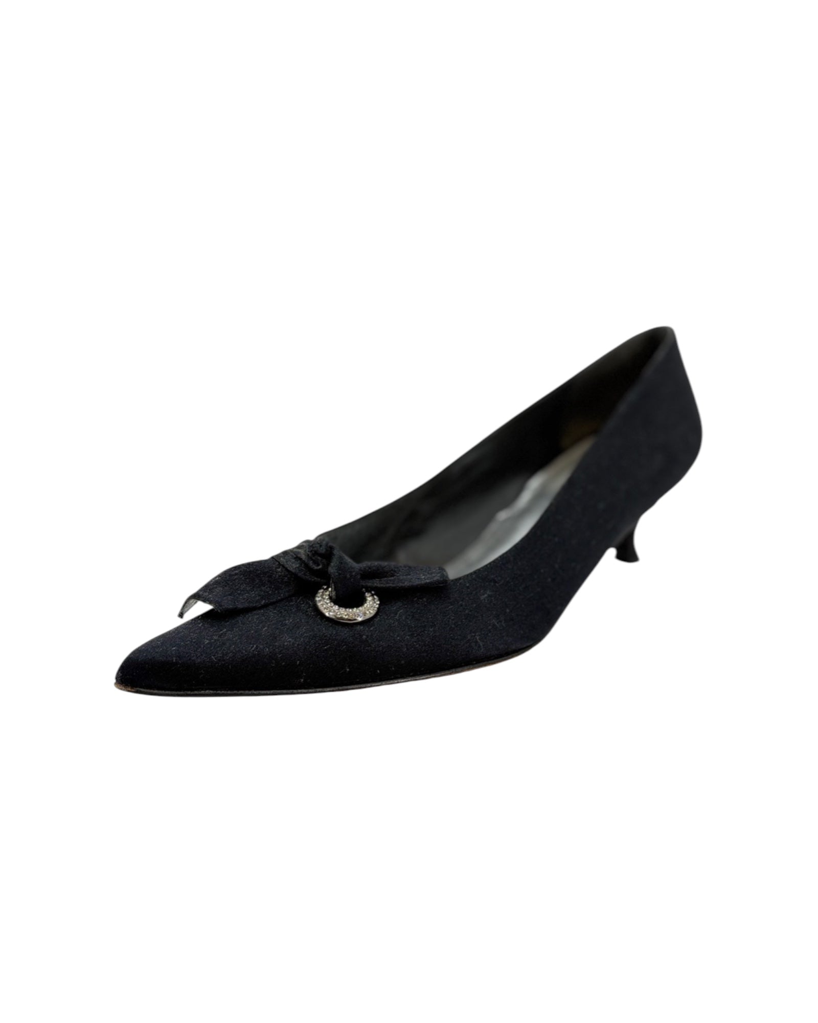 Black shoe with a decorative bow on a white background