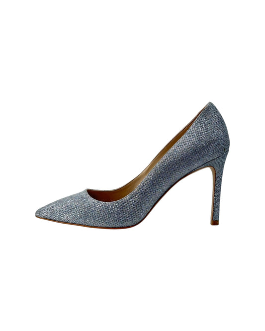 Silver glittery high-heeled shoe on a white background