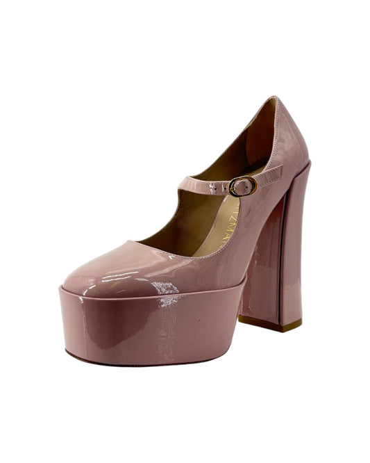 Pink platform high heel shoe on a white background