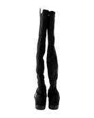 Black knee-high boots on a white background