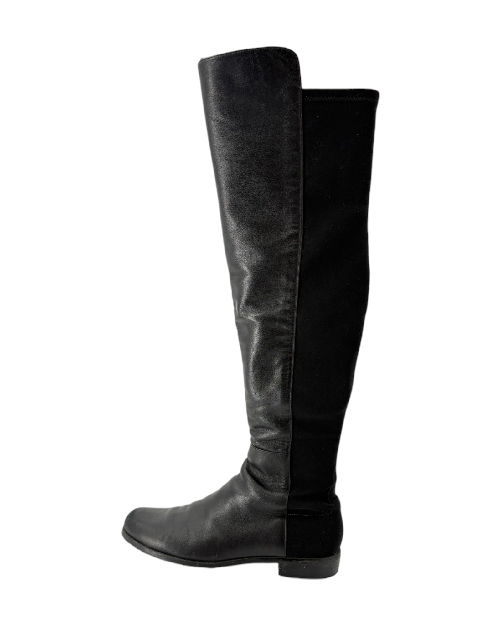 Black knee-high boots on a white background