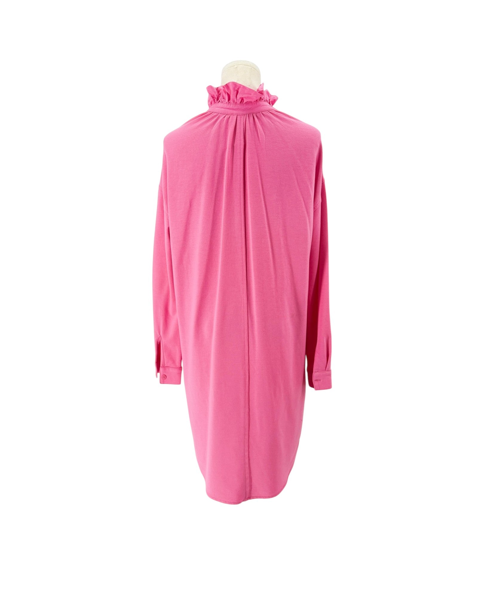 A bright pink long-sleeve dress with a gathered ruffled mock neck, displayed on a mannequin against a plain white background.