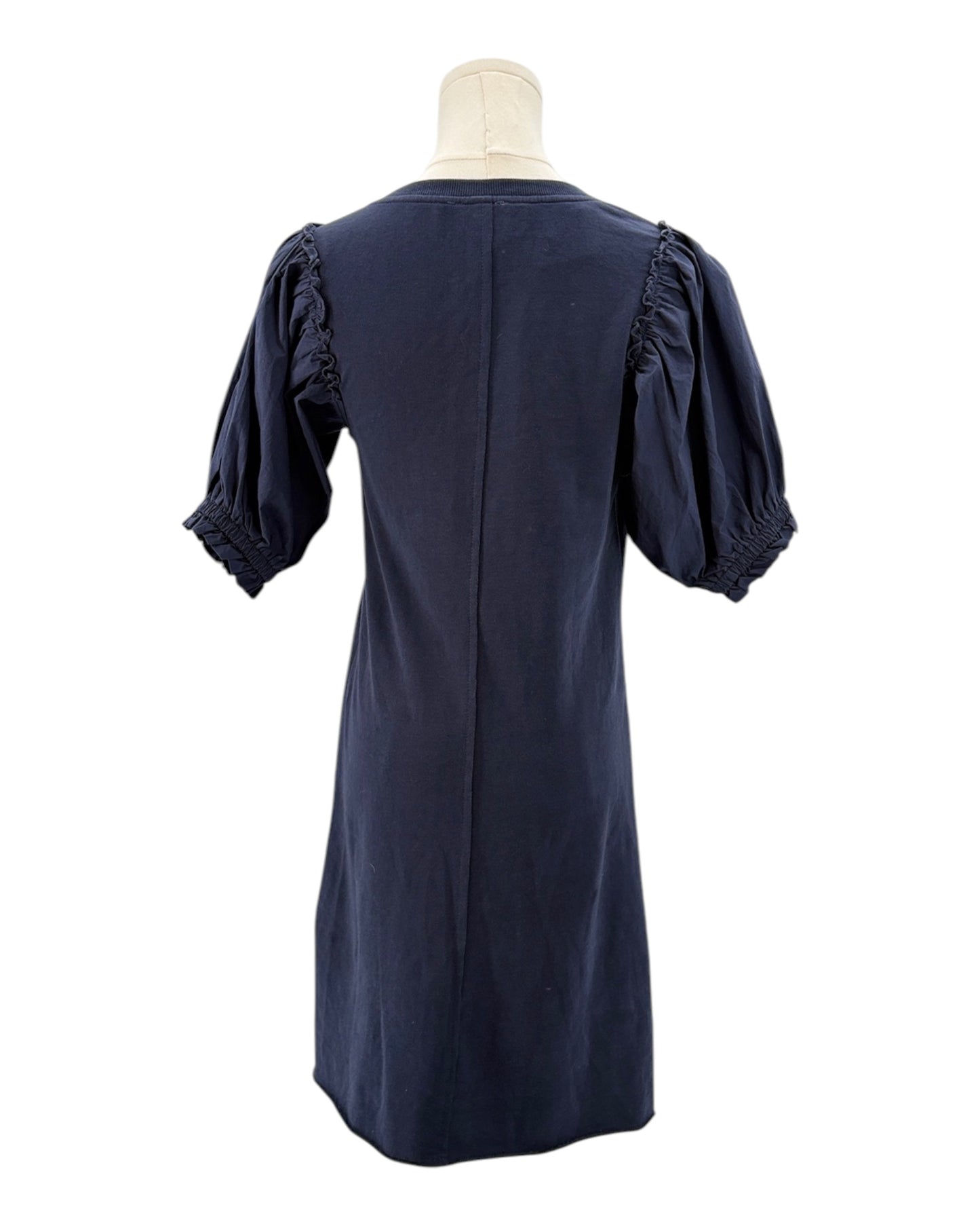 Sundays navy blue dress on a mannequin against a white background