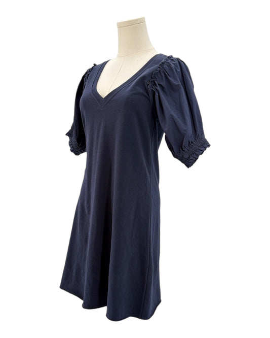 Sundays navy blue dress on a mannequin against a white background