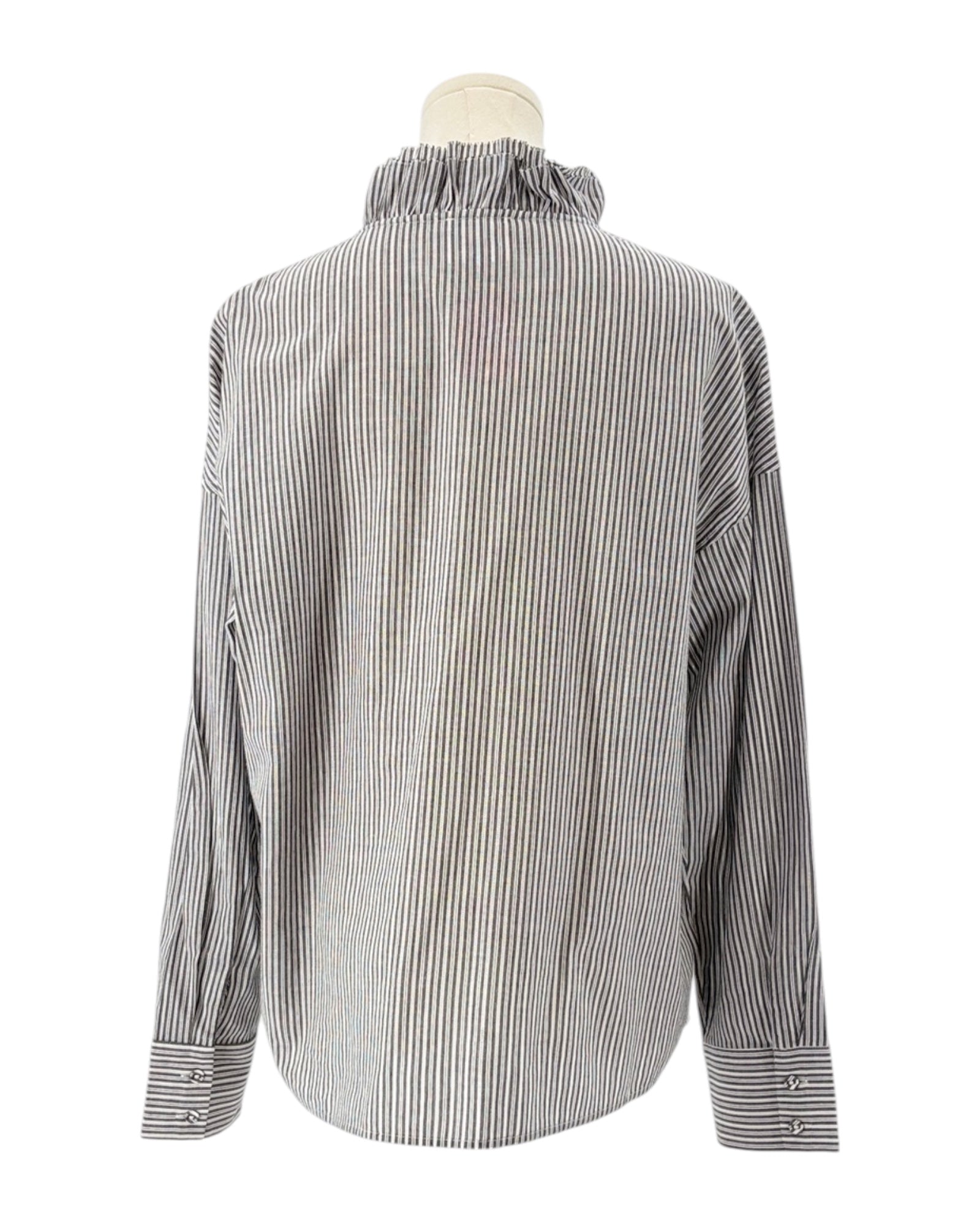 Sundays black and white striped shirt on a mannequin against a white background