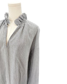 Sundays black and white striped shirt on a mannequin against a white background