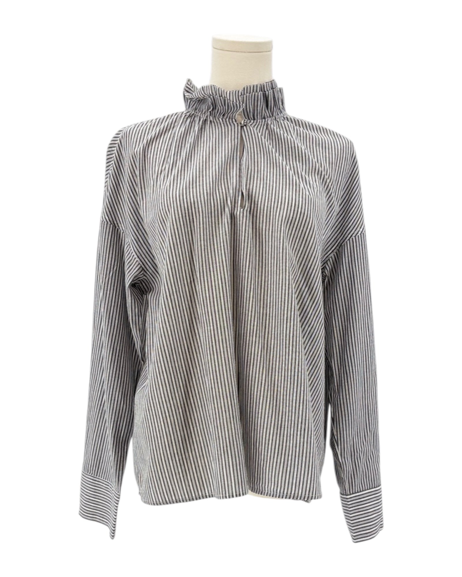 Sundays black and white striped shirt on a mannequin against a white background