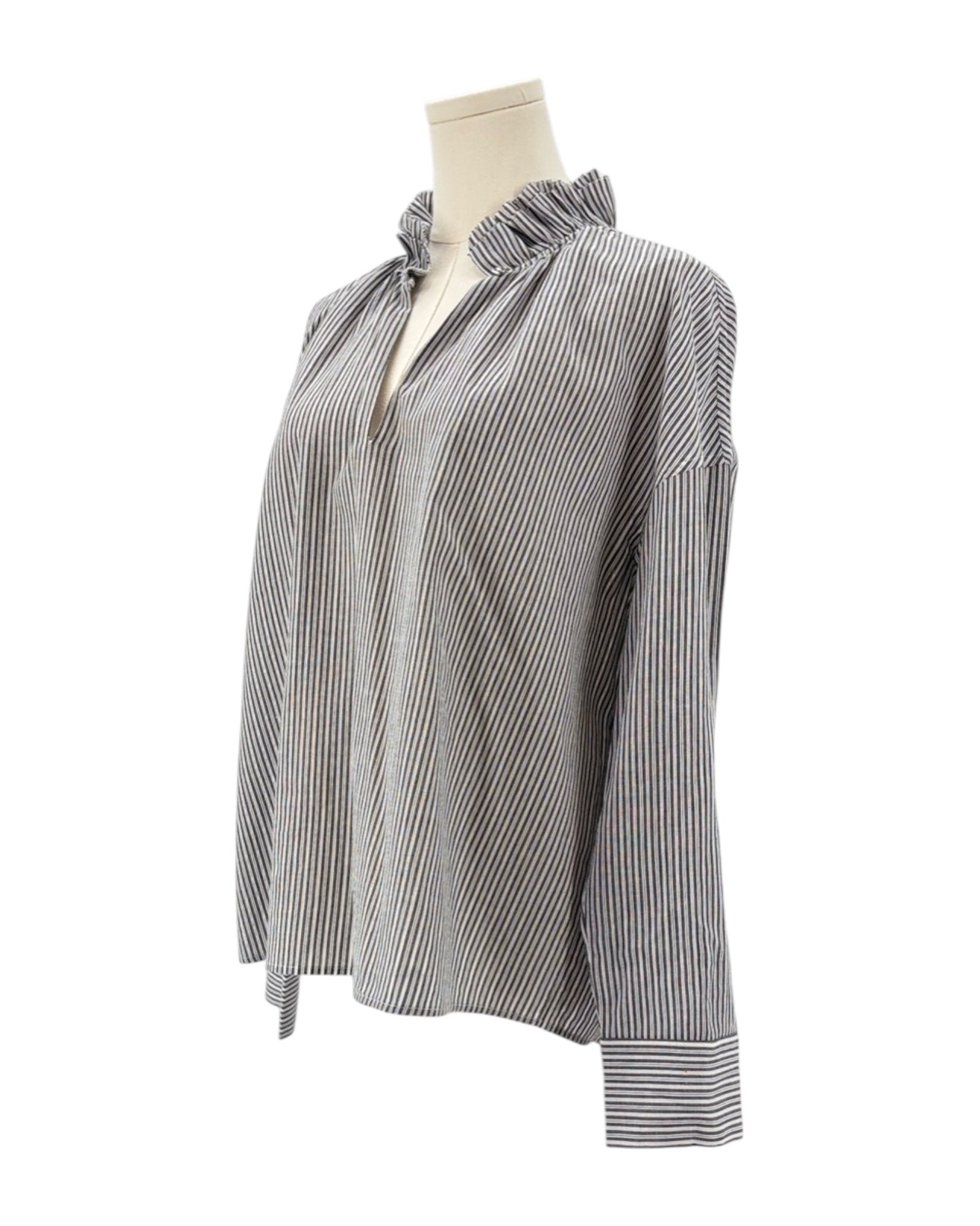 Sundays black and white striped shirt on a mannequin against a white background