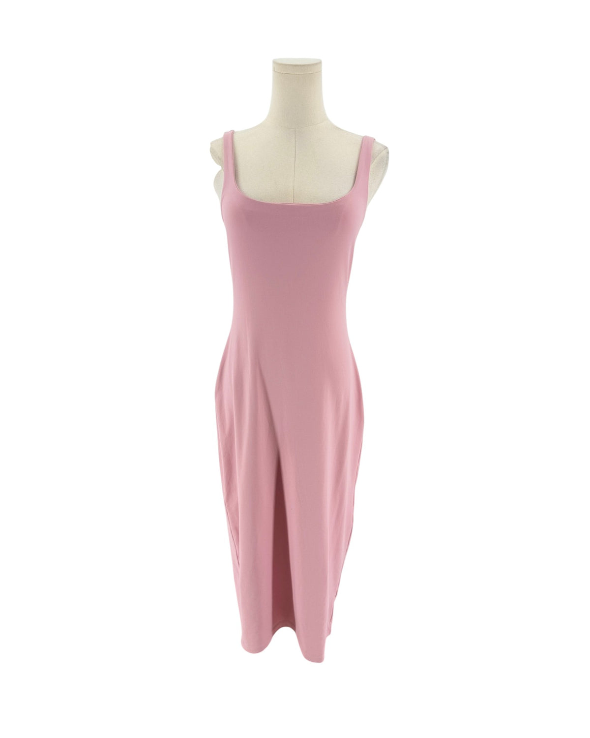A light pink sleeveless midi dress displayed on a cream mannequin torso against a plain white background.