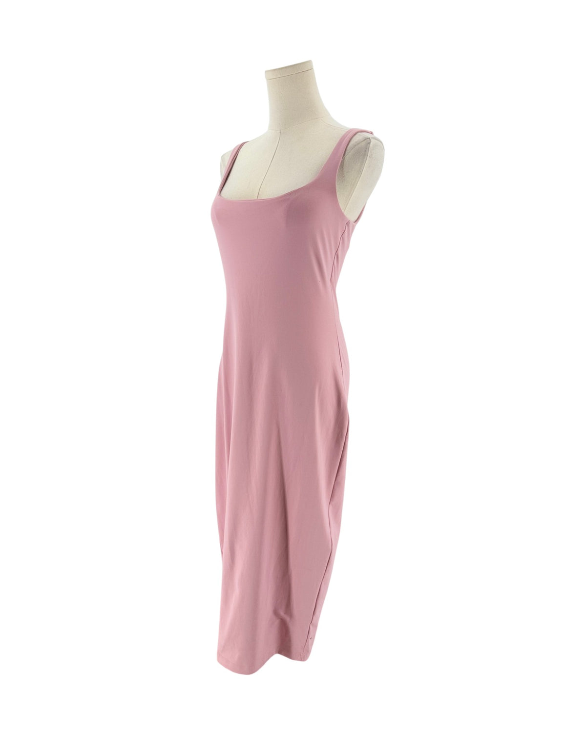 A sleeveless dusty pink maxi dress displayed on a cream mannequin torso against a plain white background.