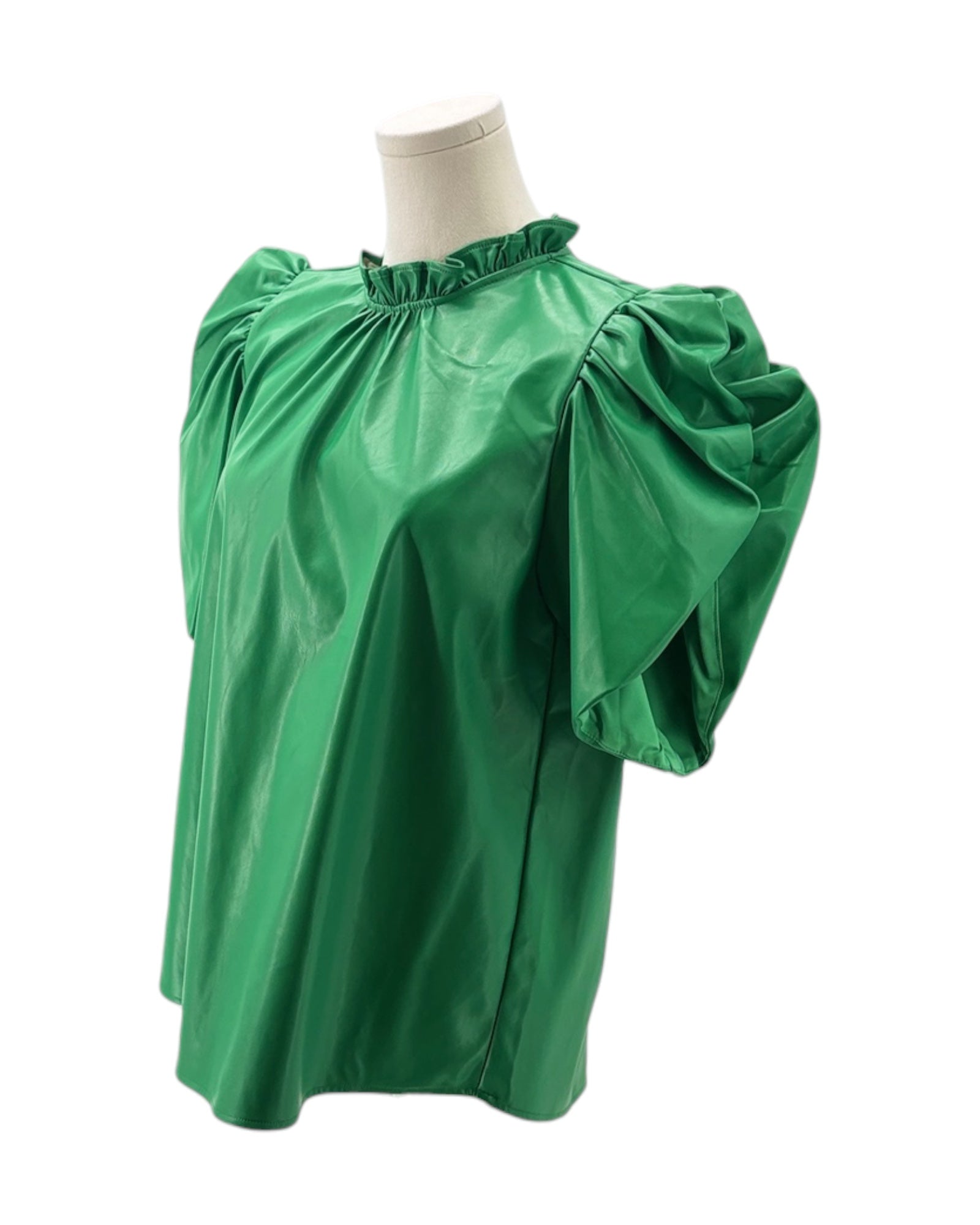 Green blouse with puff sleeves on a mannequin against a white background