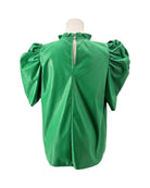 Green blouse with puffed sleeves on a mannequin against a white background