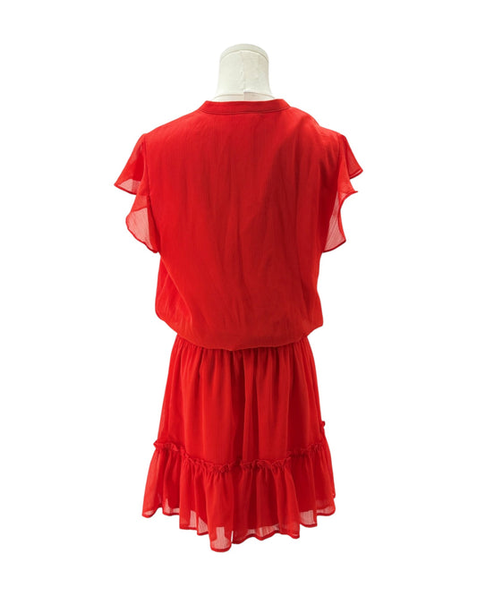 A bright red two-piece outfit consisting of a short-sleeve ruffled blouse and a matching tiered skirt, displayed on a white mannequin torso against a plain white background.