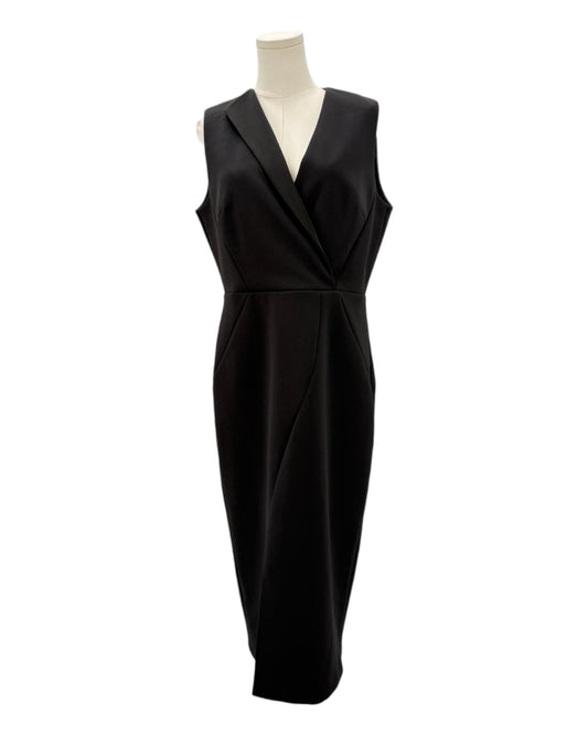 Black dress on a mannequin against a white background
