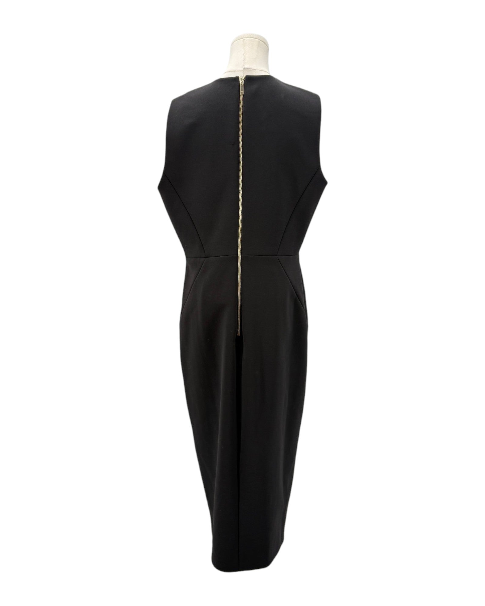 Black sleeveless dress on a mannequin against a white background