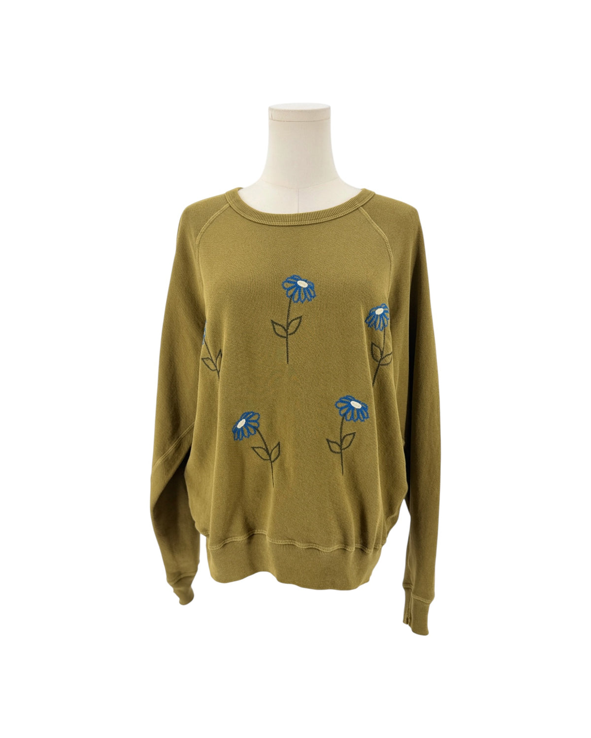Green Classic crew-neck sweatshirt, blue embroidery flowers across the front on a white background on a mannequin