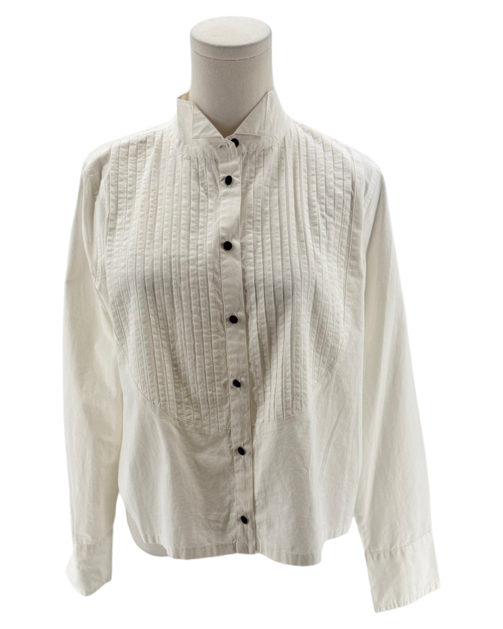 White button-up shirt on a mannequin against a white background