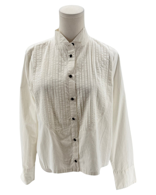 White button-up shirt on a mannequin against a white background