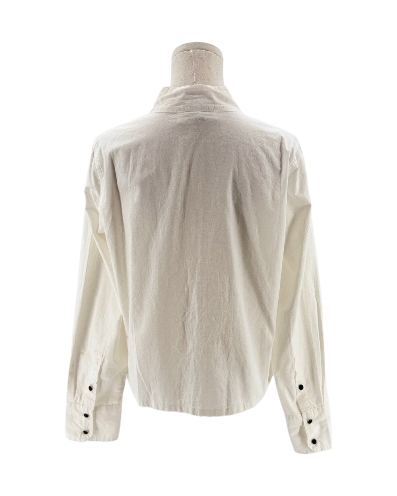White shirt on a mannequin with a white background