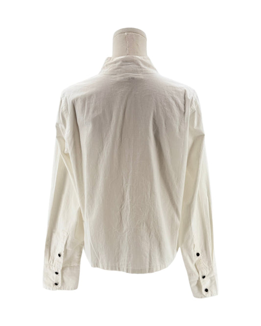 White shirt on a mannequin with a white background