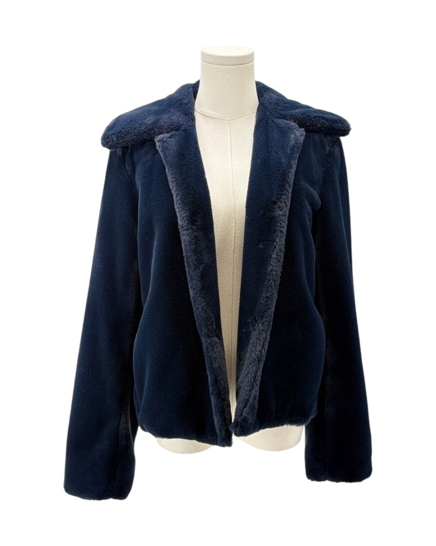 Navy blue coat with fur trim on a mannequin against a white background